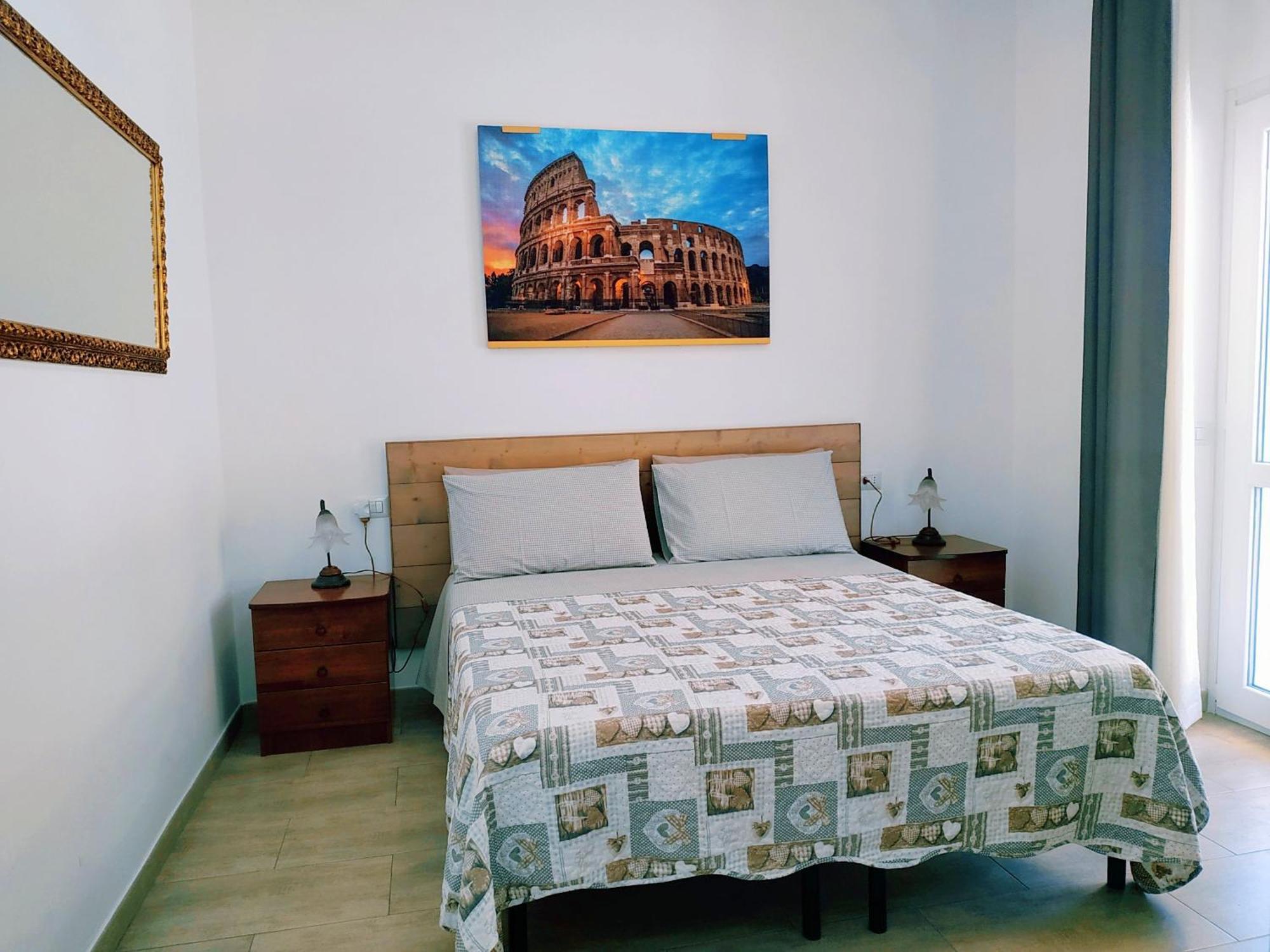 Un Passo Dal Mare Bed & Breakfast Fiumicino Exterior photo A bedroom